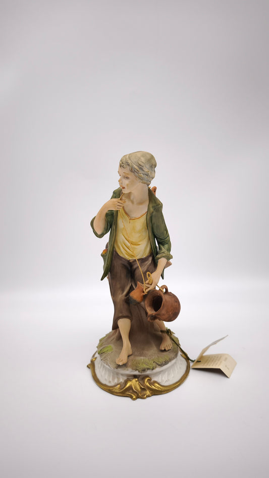 77364 Statuina Nico Venzo in porcellana biscuit, Capodimonte, vasaio