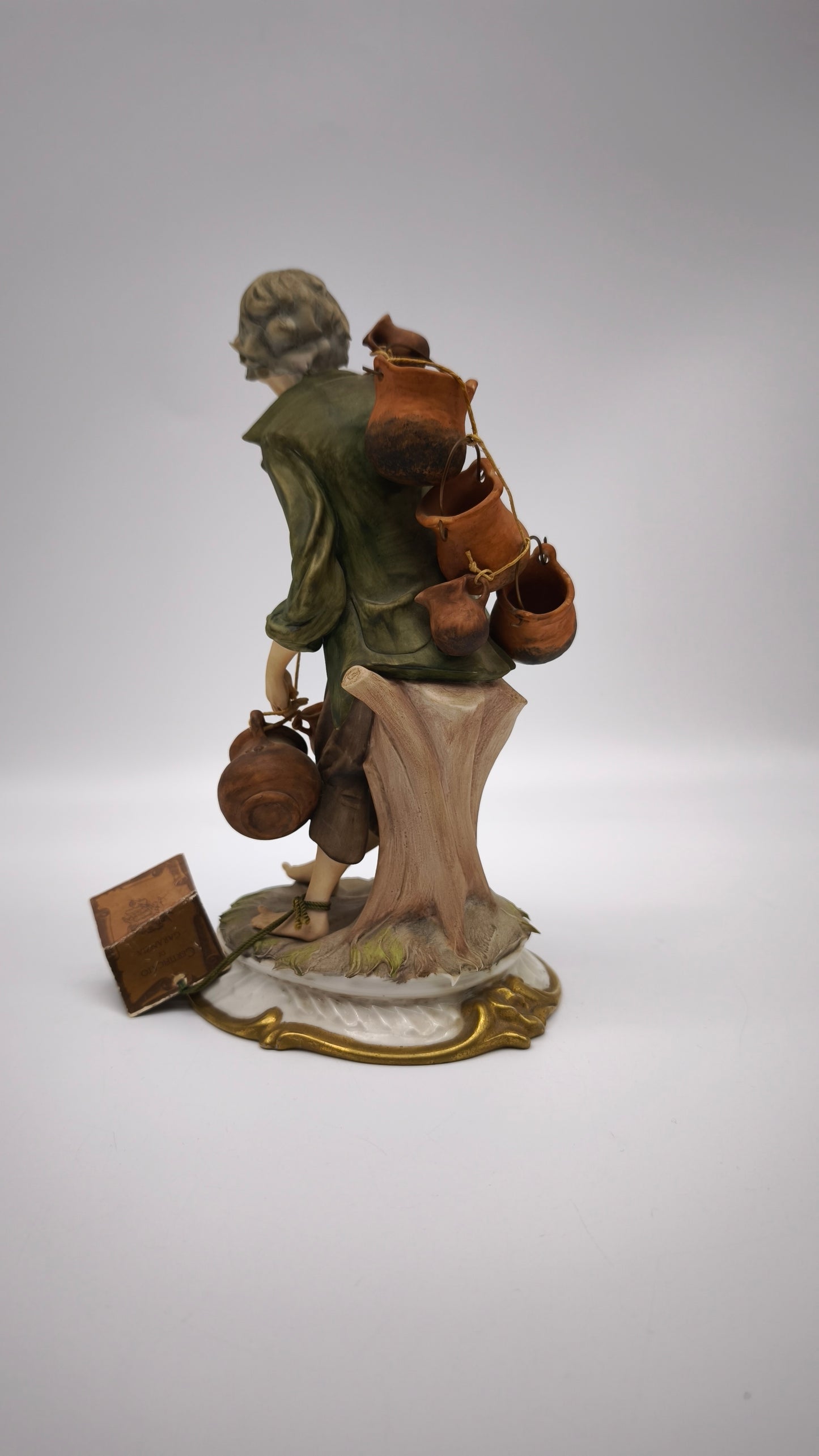 77364 Statuina Nico Venzo in porcellana biscuit, Capodimonte, vasaio