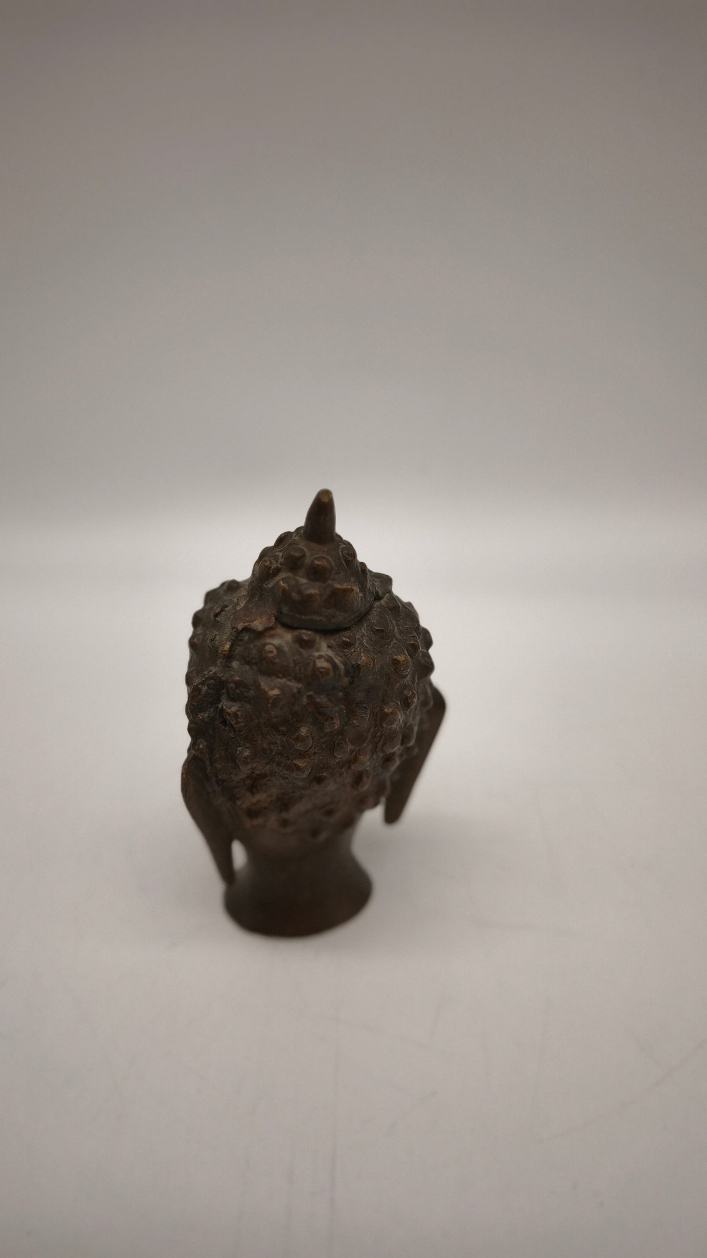84250 Testa di Buddha in bronzo