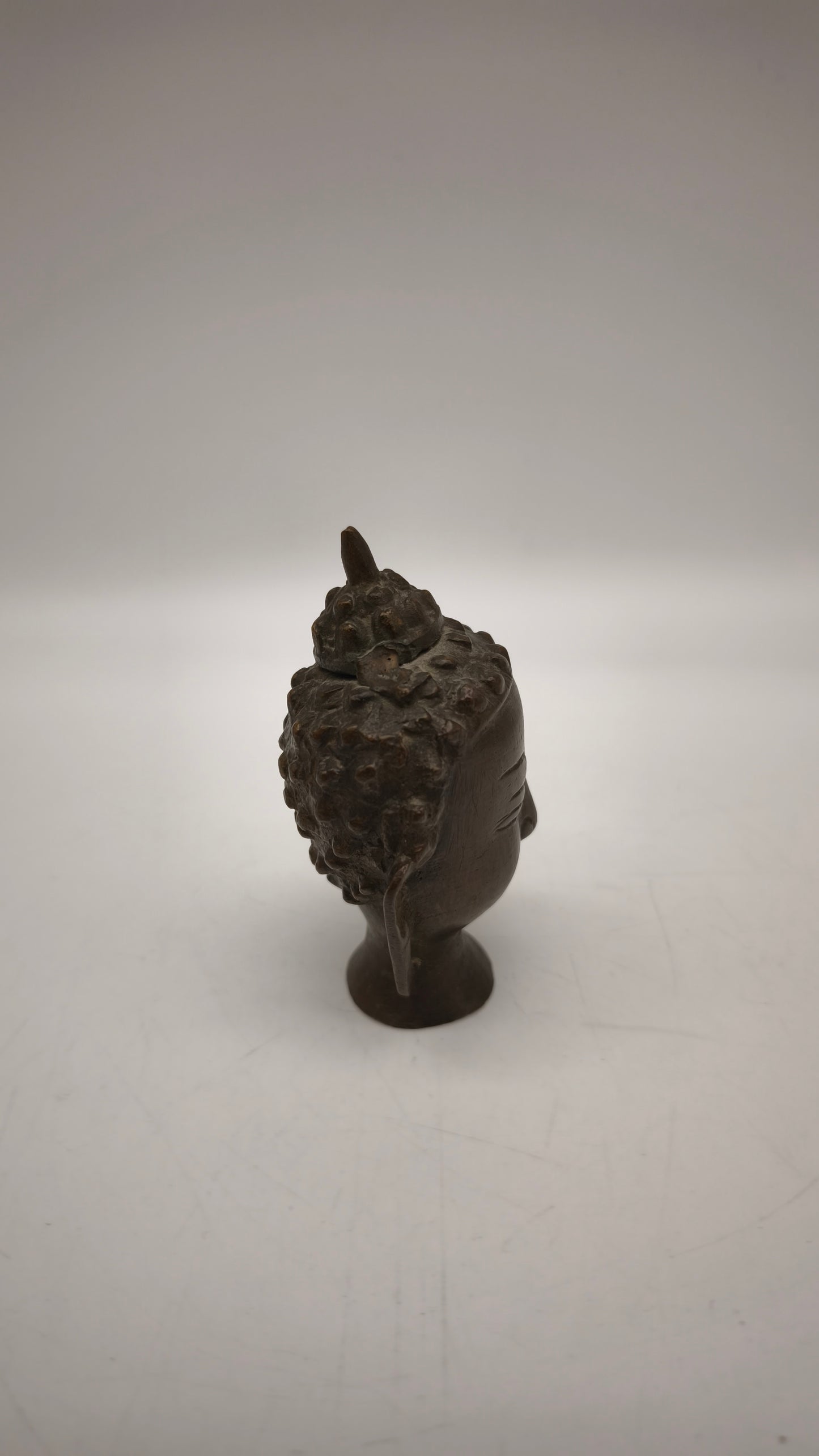 84250 Testa di Buddha in bronzo