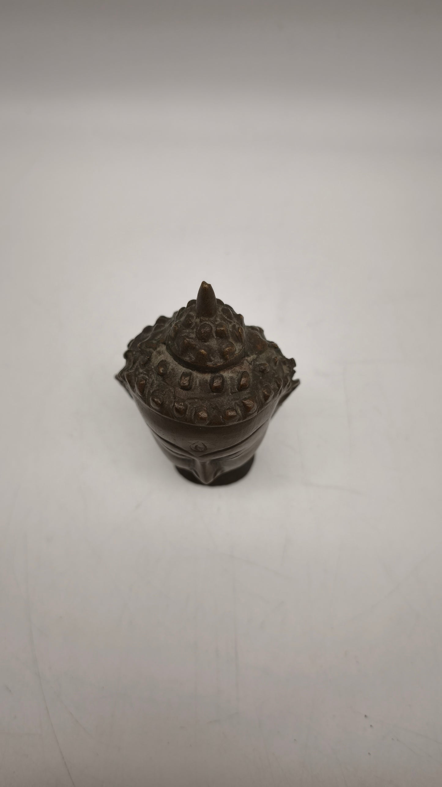 84250 Testa di Buddha in bronzo