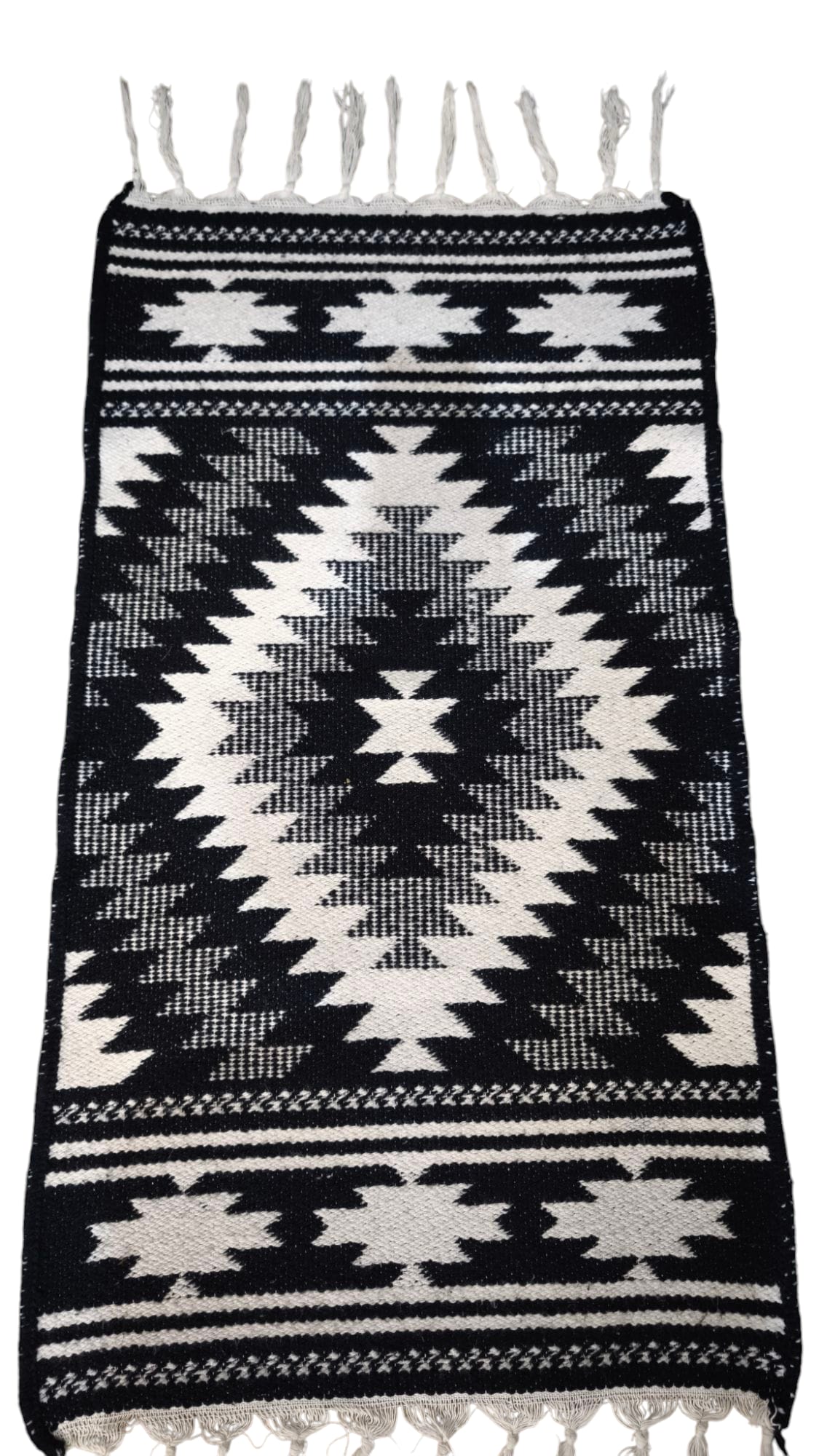 79380 Tappeto in lana bianco e nero con decorazione geometrica