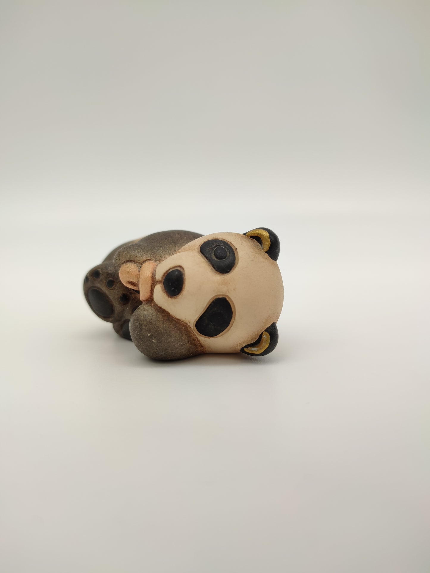 63277 Statuina Thun panda con ciuccio