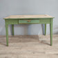 71284 Tavolo in legno con base verde e cassetto