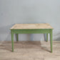 71284 Tavolo in legno con base verde e cassetto