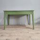 71284 Tavolo in legno con base verde e cassetto