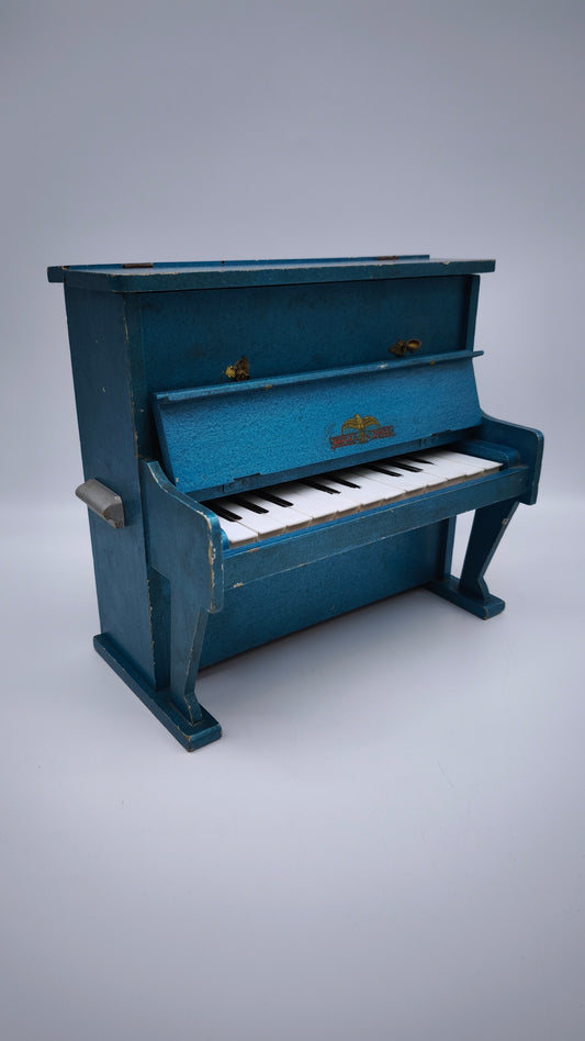 78999 Piccolo pianoforte in legno