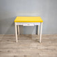 79803 Tavolo allungabile con base bianca e piano giallo
