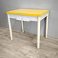 79803 Tavolo allungabile con base bianca e piano giallo