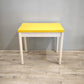 79803 Tavolo allungabile con base bianca e piano giallo