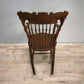 81453 Sedia a dondolo in legno con intagli