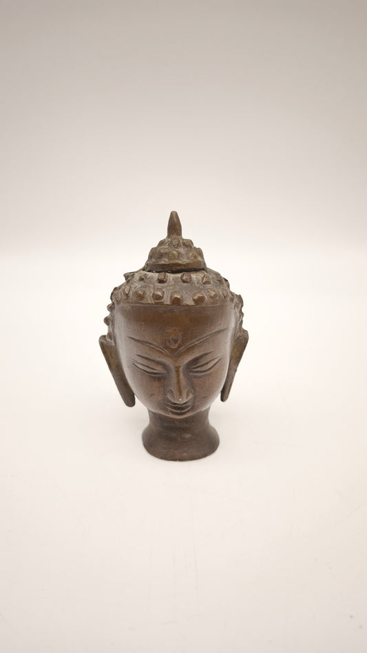 84250 Testa di Buddha in bronzo