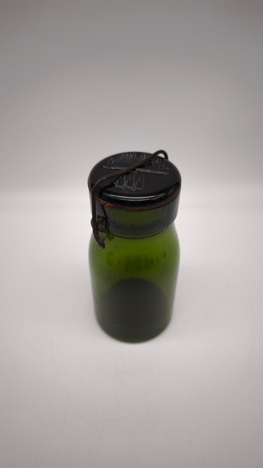 87875 Barattolo vintage in vetro verde Wauwill