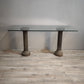 88621 Console con piano in cristallo e colonne in pietra