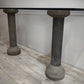 88621 Console con piano in cristallo e colonne in pietra