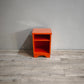 88673 Comodino a giorno color arancio