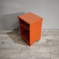 88673 Comodino a giorno color arancio