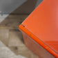 88673 Comodino a giorno color arancio