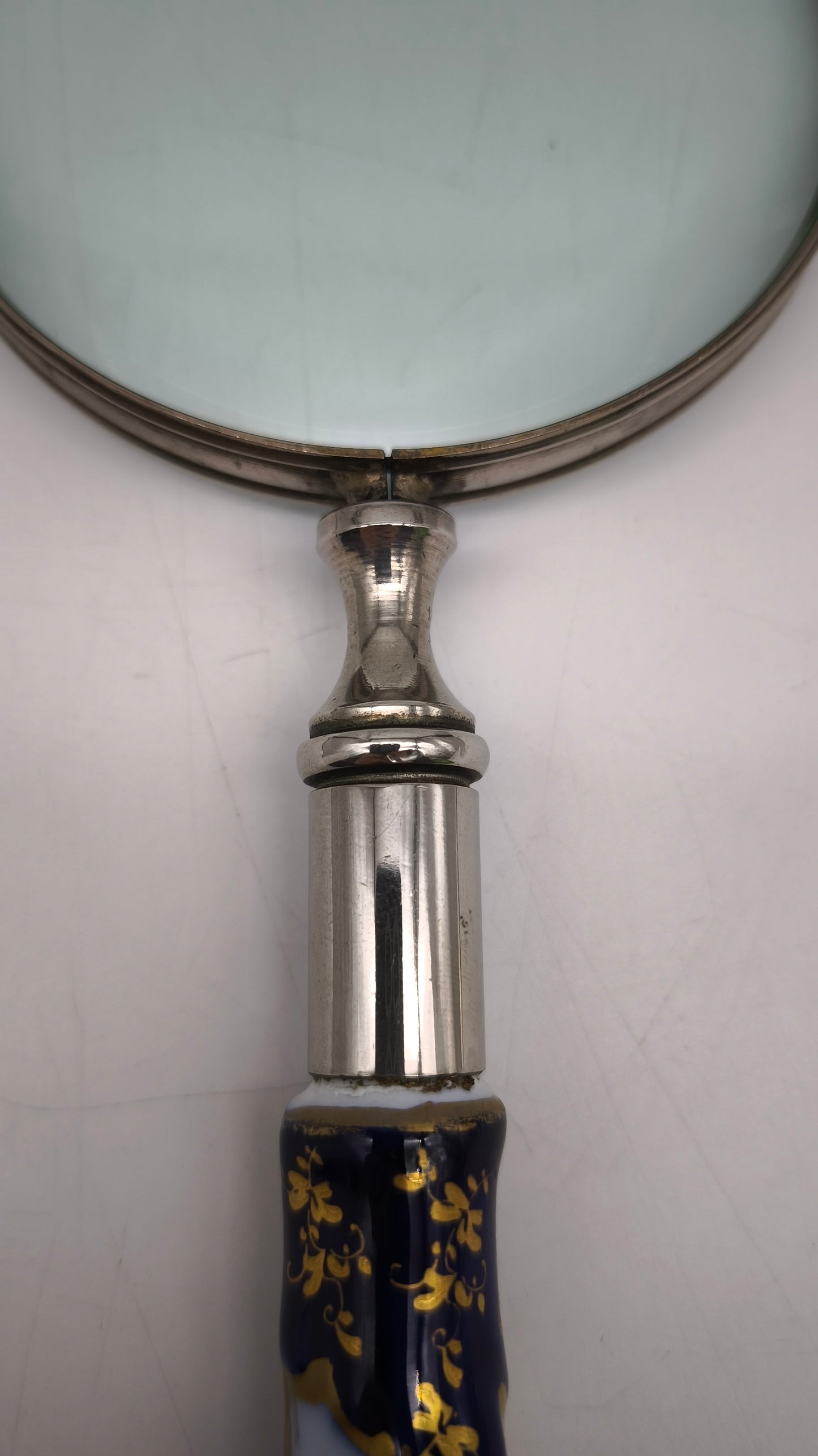 88951 Lente con manico in ceramica