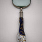 88951 Lente con manico in ceramica