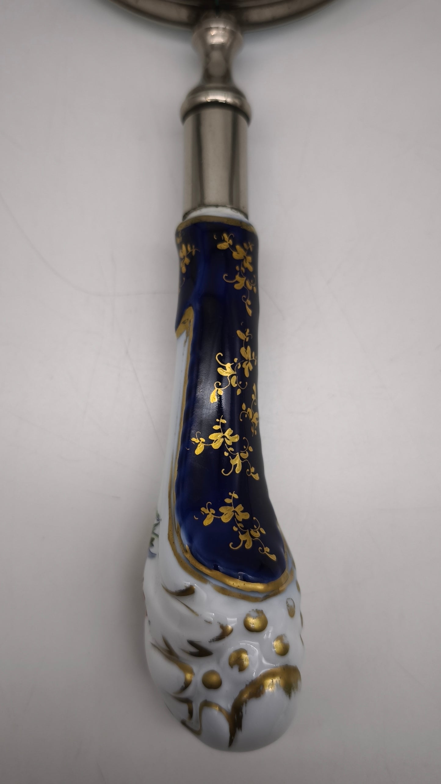 88951 Lente con manico in ceramica