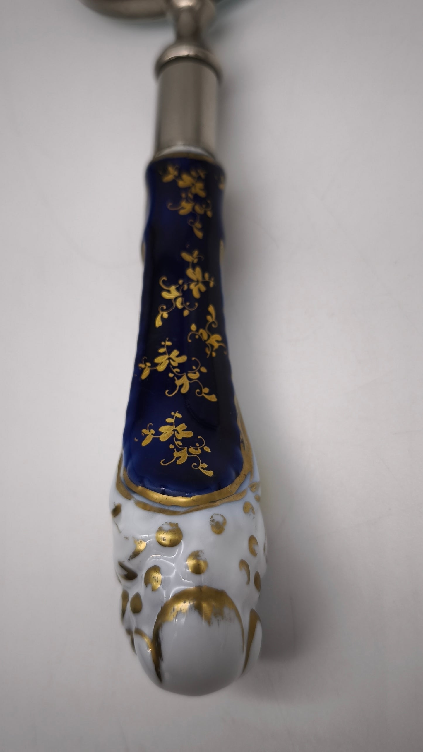 88951 Lente con manico in ceramica