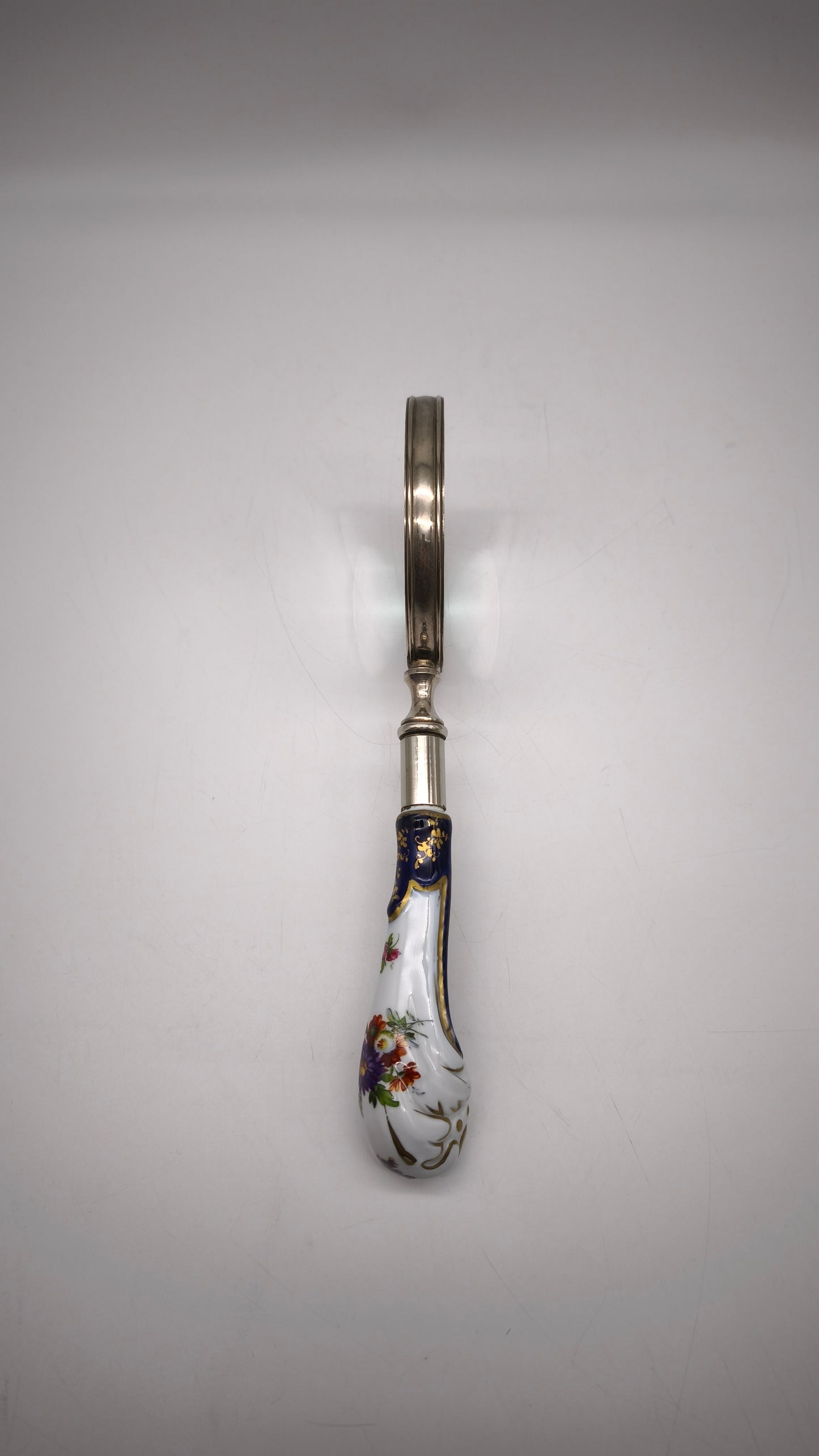 88951 Lente con manico in ceramica