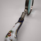 88951 Lente con manico in ceramica