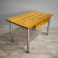89283 Tavolo con base in alluminio e piano in legno