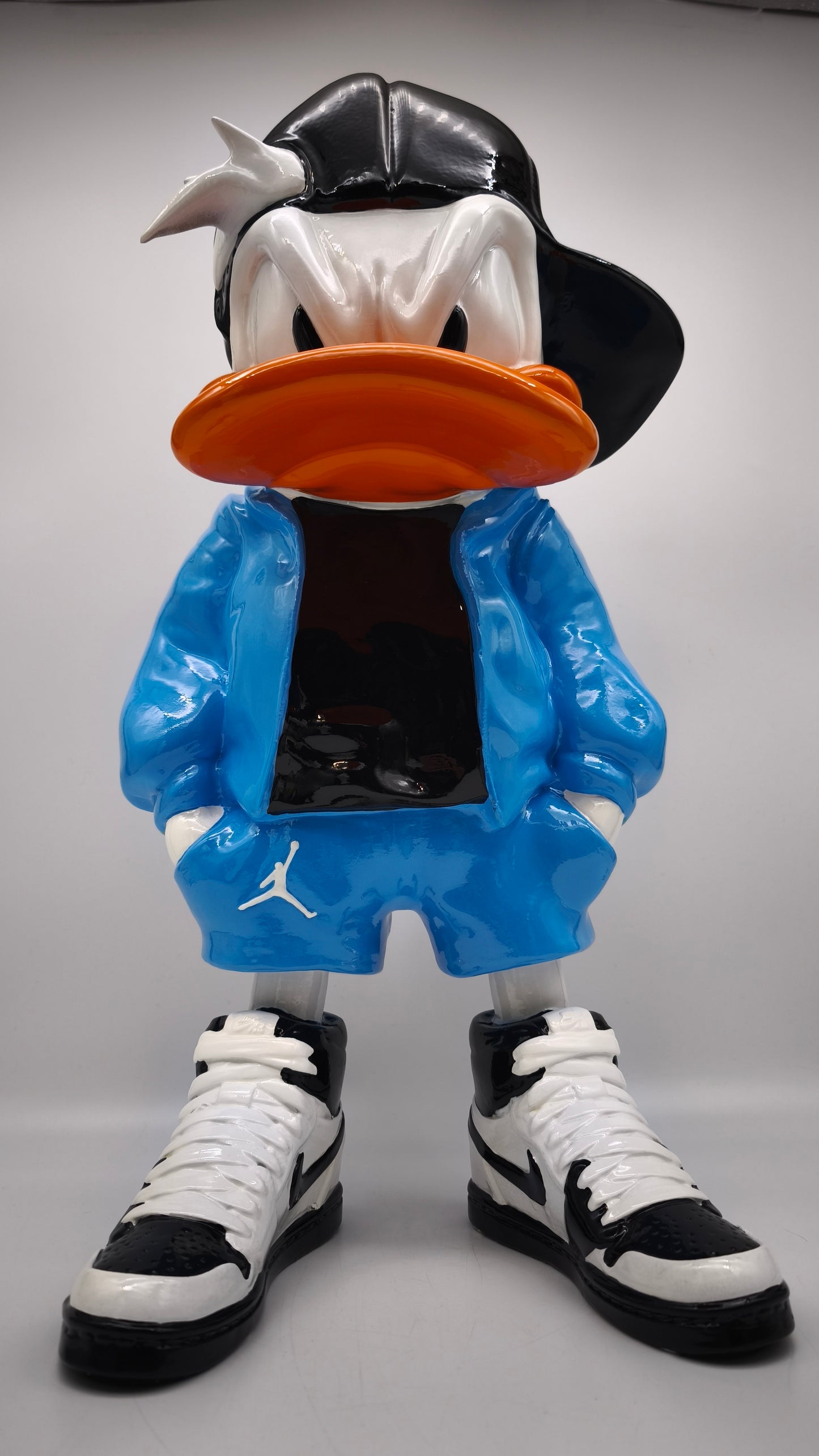 89603 Statua in resina Paperino streetwear