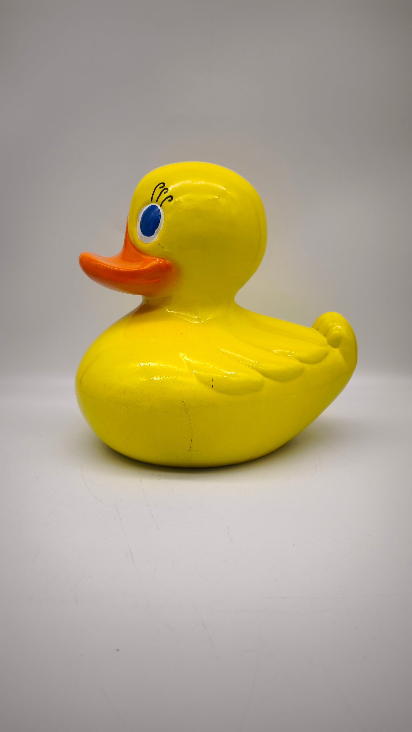 89620 Statua in resina paperella gialla