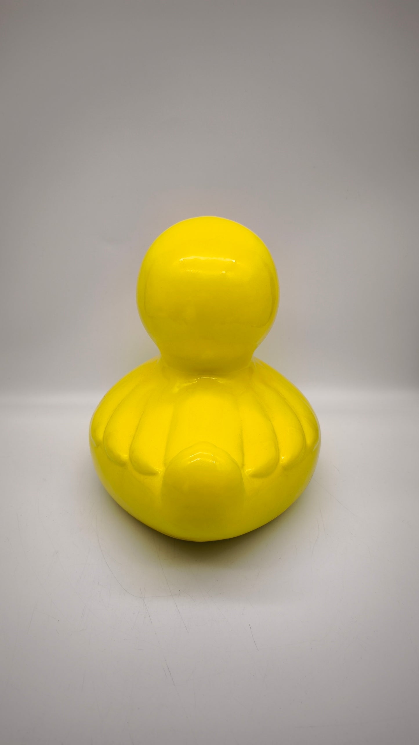 89620 Statua in resina paperella gialla