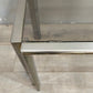 89660 Trittico di tavolini in ottone e vetro fumé