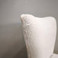 58 Poltroncina da camera rivestita in tessuto bianco