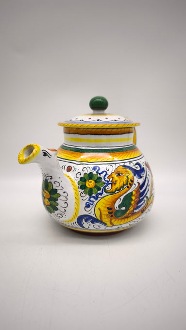 83 Set teiera, lattiera e 4 tazze con piattino in ceramica Deruta