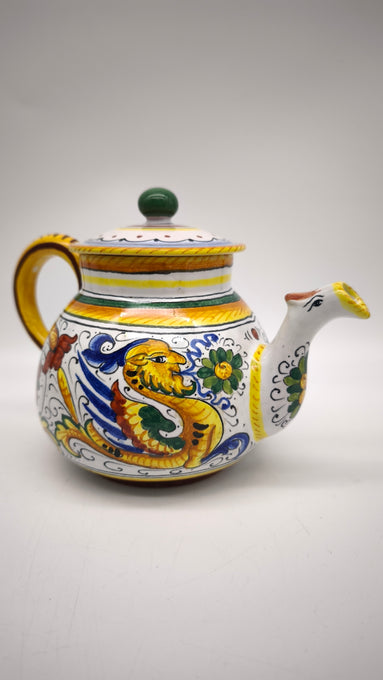 83 Set teiera, lattiera e 4 tazze con piattino in ceramica Deruta