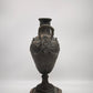 90244 Vaso in metallo lavorato con base in marmo