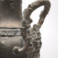 90244 Vaso in metallo lavorato con base in marmo