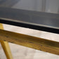 193 Console in ottone e vetro fumé