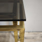 193 Console in ottone e vetro fumé