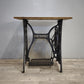 191 Base in ghisa Singer con piano in legno