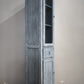 91711 Libreria vetrina a colonna in legno dipinta azzurra