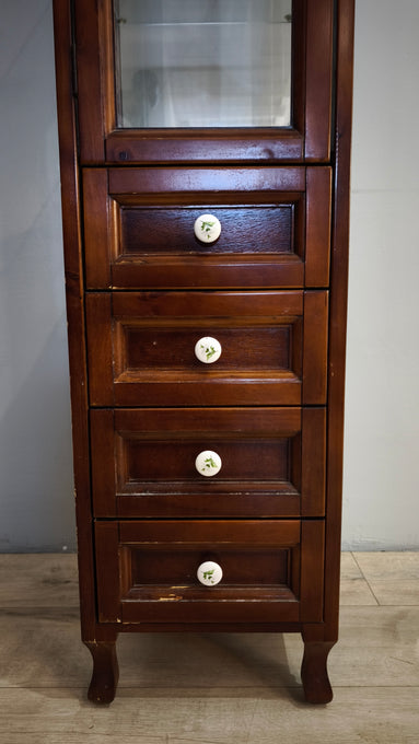 91791 Vetrina a colonna in legno con quattro cassetti
