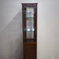 91791 Vetrina a colonna in legno con quattro cassetti