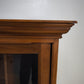 199 Vetrina due ante in legno con sportelli scorrevoli