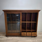 199 Vetrina due ante in legno con sportelli scorrevoli