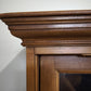 199 Vetrina due ante in legno con sportelli scorrevoli