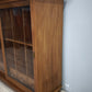 199 Vetrina due ante in legno con sportelli scorrevoli