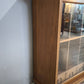 199 Vetrina due ante in legno con sportelli scorrevoli
