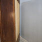 214 Armadio due ante in legno con cassetto inferiore